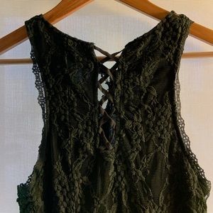 Lacy sleeveless top in a dark olive green.